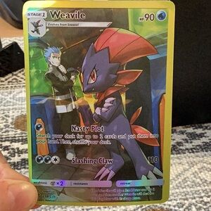 Weavile Pokémon Card - Black and Red